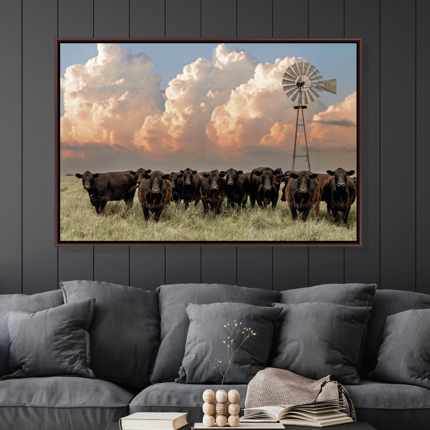 photo of a herd of black Angus cows and a blue pink sunset