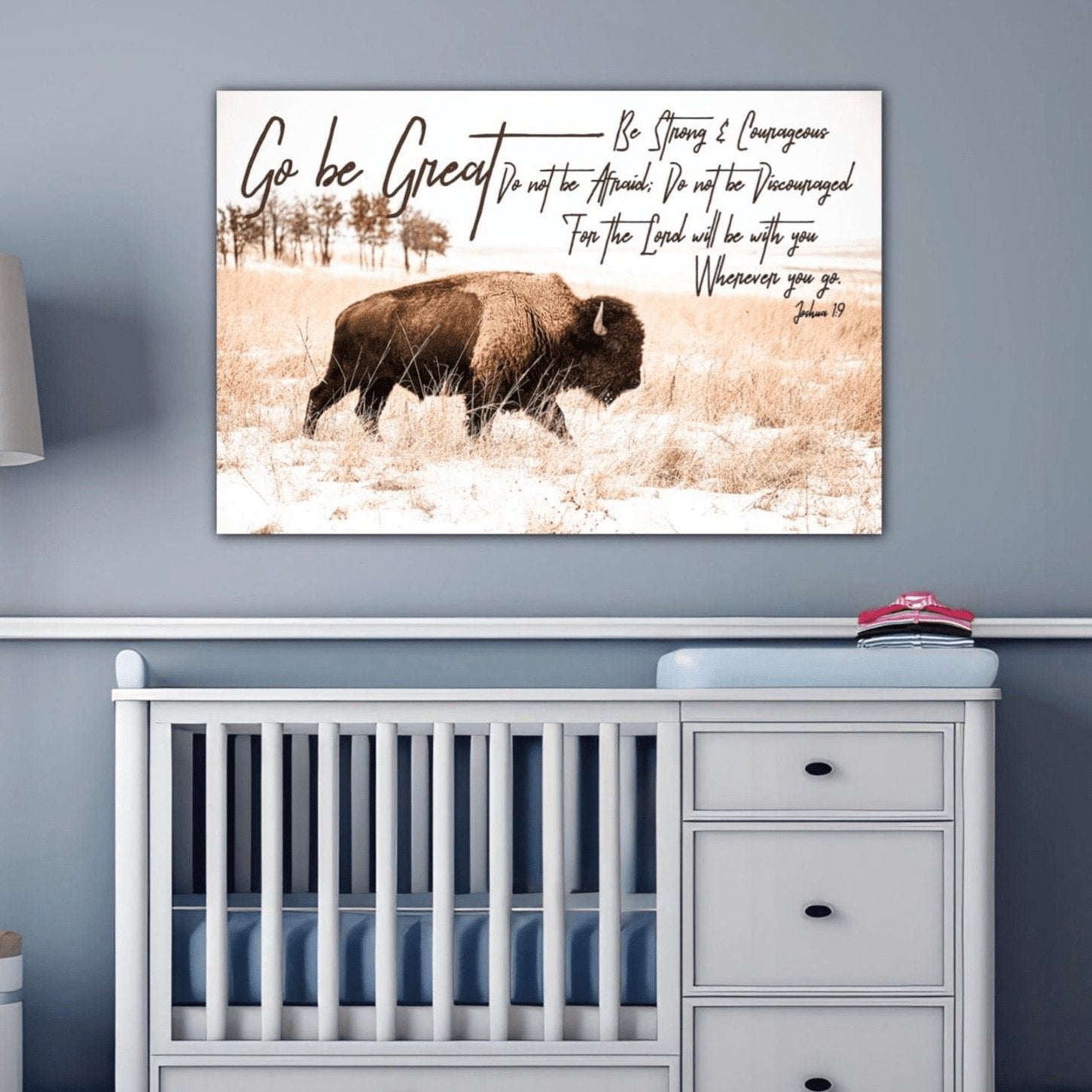 Western nursery wall art decor, bison walking in snow and the "go be great" bible verse.